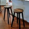 textured pinewood barstools